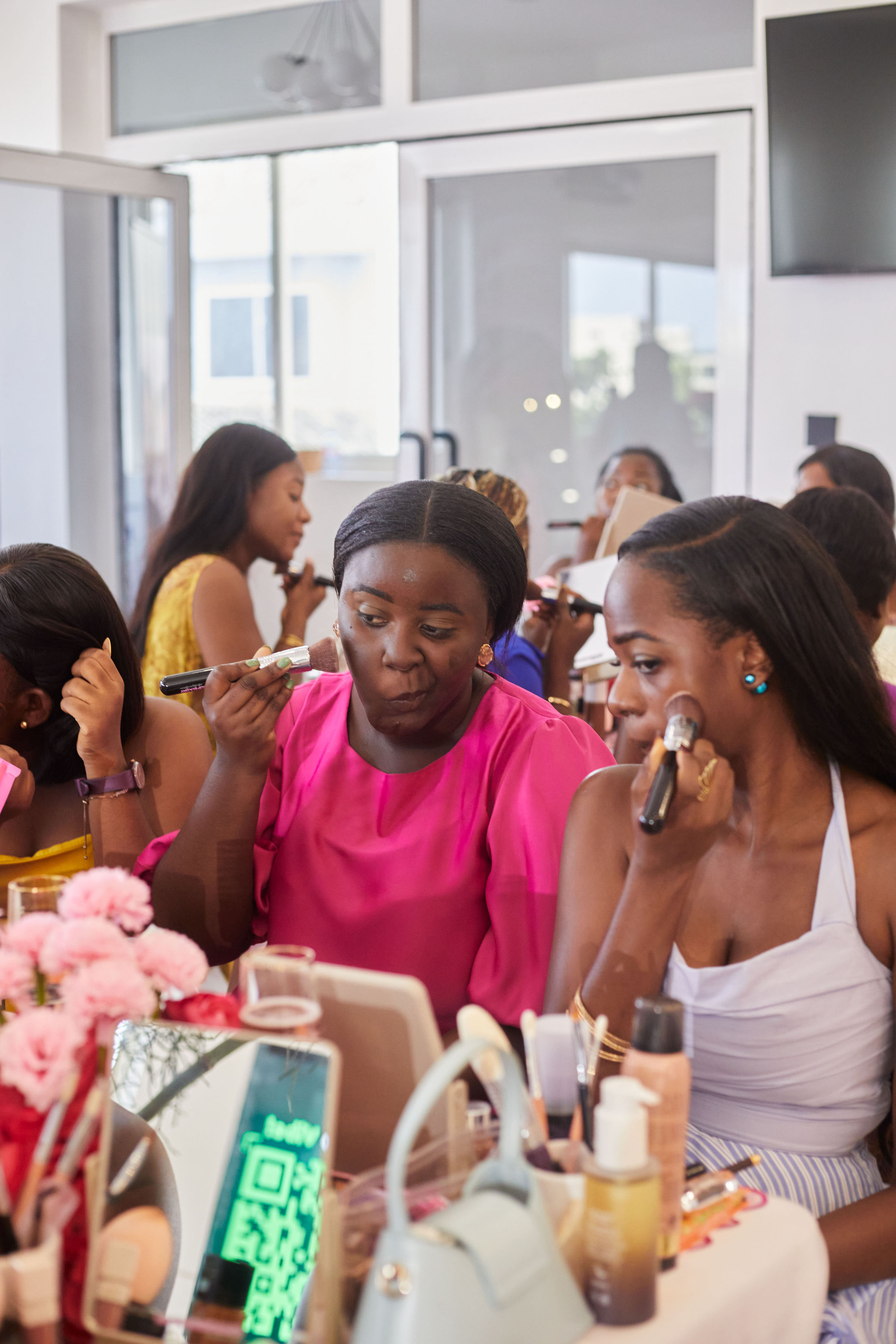 Attendees applying their own makeup at Edition 1